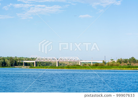 Railway bridge across the river Sok in the village of Malaya Tsarevschina, Samara region Russia 99907633