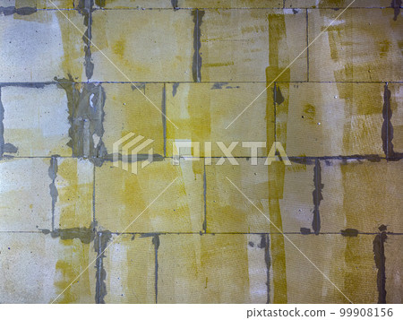 Texture of rough foam concrete blocks wall for background 99908156