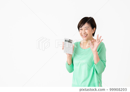 Middle-aged woman with a calculator Middle-aged woman with a calculator 99908203