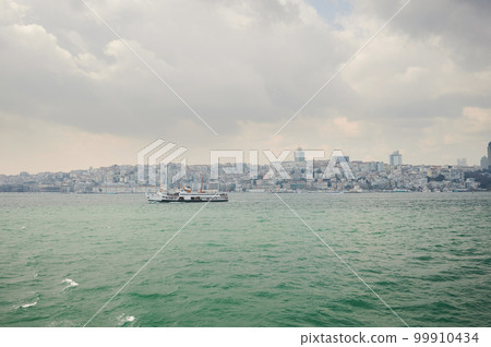 Boat ferry move on Istanbul background 99910434
