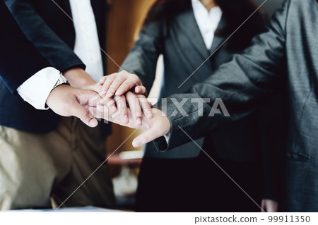 business group people showing unity with their hands together. business group people showing unity with their hands together. 99911350
