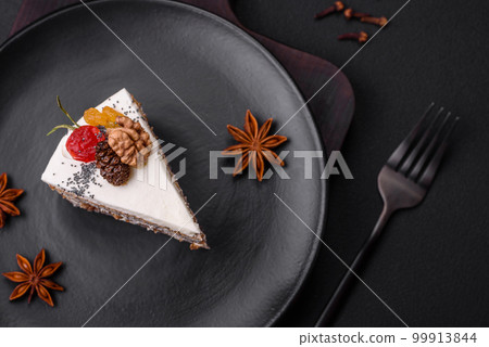 Delicious beautiful piece of cake with cream and berries Delicious beautiful piece of cake with cream and berries 99913844