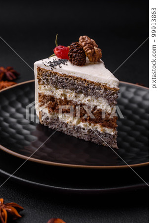 Delicious beautiful piece of cake with cream and berries Delicious beautiful piece of cake with cream and berries 99913863