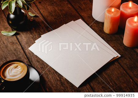 Mock up of closed magazines on a wooden table with rustic style at night. 3d render Mock up of closed magazines on a wooden table with rustic style at night. 3d render 99914935