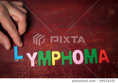 Lymphoma. Colorful text on wood texture background Lymphoma. Colorful text on wood texture background 99918345