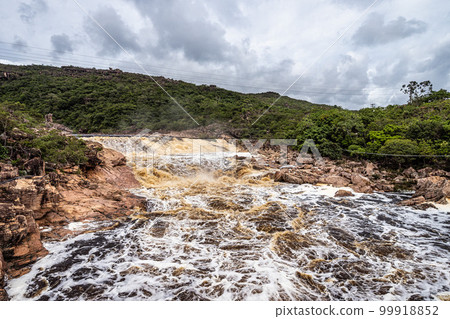 Donana Waterfall in Paraguassu River with dark waters in Andarai, Chapada Diamantina, Bahia in Brazil Donana Waterfall in Paraguassu River with dark waters in Andarai, Chapada Diamantina, Bahia in Brazil 99918852