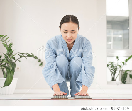 Asian woman folded her palms on sadhu boards.  99921109
