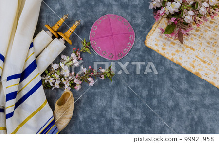 One of key features Passover requirement for kosher food is unleavened matzah bread on table 99921958