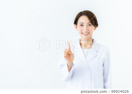 middle-aged woman in white coat middle-aged woman in white coat 99924026