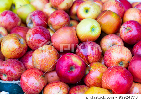 Red-yellow apples on the counter Red-yellow apples on the counter 99924778