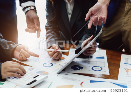 business group people are meeting and discussing budget and marketing plans in order to strategize to win over partners in order to keep the company number one. 99925191