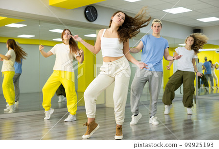 Young girl dancing modern dance in studio 99925193