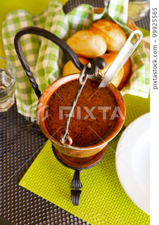 Traditional Slovenian Bograc in cauldron 99925565