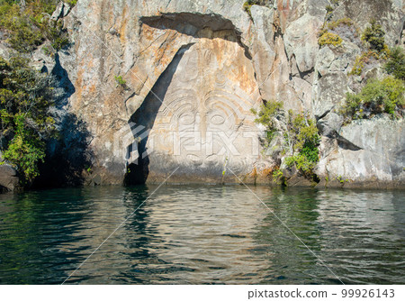 The Maori rock carvings the iconic tourist attraction place in lake Taupo the largest fresh water lake in New Zealand. 99926143