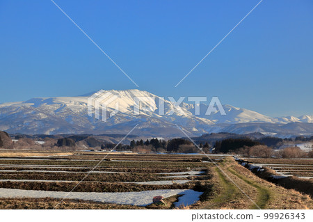 Shonai plain landscape in March Rice terraces and Mt. Gassan 99926343