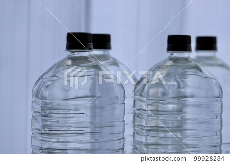 Unlabelled, unopened plastic bottle of 2 liters of mineral water 99928284