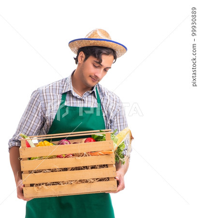 Young farmer with fresh produce isolated on white background Young farmer with fresh produce isolated on white background 99930889