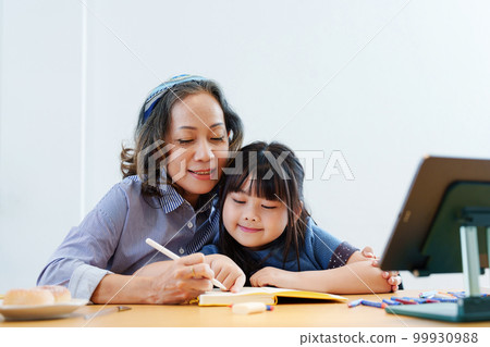 Asian portrait, grandchild granddaughter grandma grandmother and granddaughter happily join in activities to enhance skills for grandchildren. Asian portrait, grandchild granddaughter grandma grandmother and granddaughter happily join in activities to enhance skills for grandchildren. 99930988