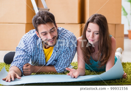 Young family planning home refurbishing in DIY concept 99931556