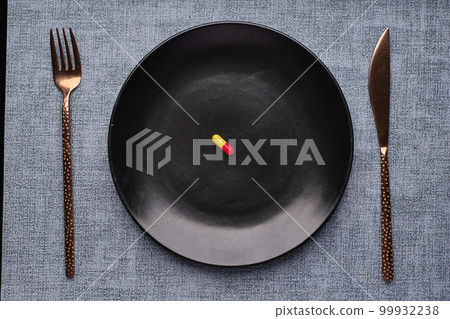 top view of single capsules on plate top view of single capsules on plate 99932238