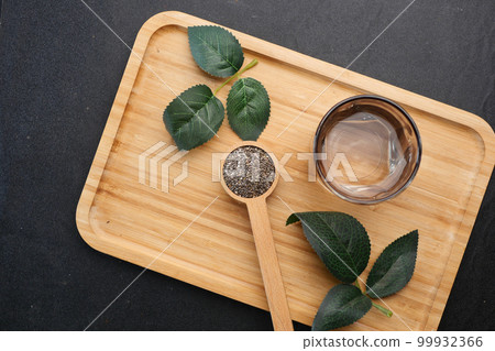top view of chia seed in a wooden spoon top view of chia seed in a wooden spoon 99932366