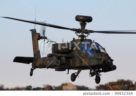 An AH-64 combat helicopter performing a demonstration flight at the Tachikawa Disaster Prevention Air Festival An AH-64 combat helicopter performing a demonstration flight at the Tachikawa Disaster Prevention Air Festival 99932384