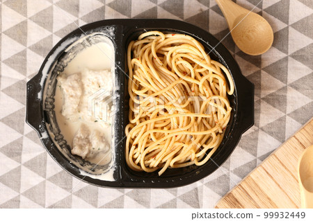 top view of pasta in a take away container top view of pasta in a take away container 99932449