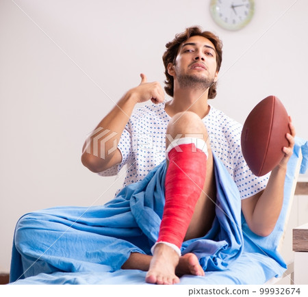 Injured man waiting treatment in the hospital 99932674