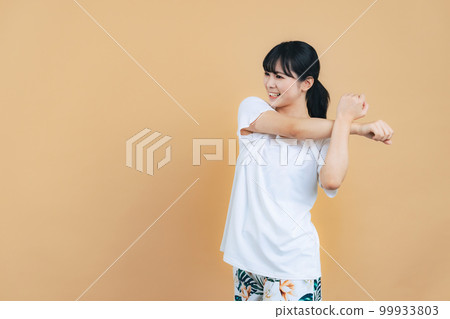 Women stretching 99933803