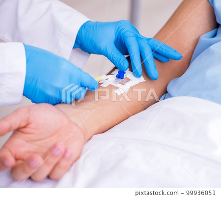 Male patient in blood transfusion concept Male patient in blood transfusion concept 99936051