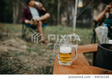 selective focus beer glass in the camping 99936286