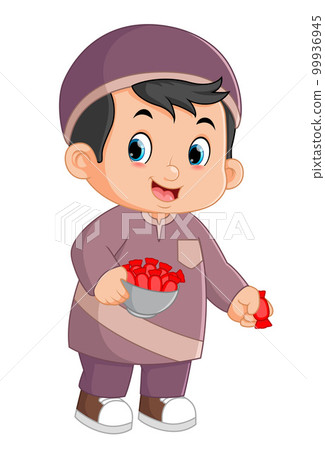 a cute muslim boy brings a big bowl and distributes lots of candy a cute muslim boy brings a big bowl and distributes lots of candy 99936945