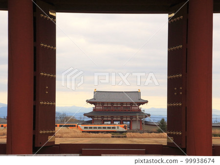 View of the Kintetsu Nara Line passing in front of the Suzaku Gate from the Daigoku Gate in the site of the World Heritage Heijo Palace View of the Kintetsu Nara Line passing in front of the Suzaku Gate from the Daigoku Gate in the site of the World Heritage Heijo Palace 99938674