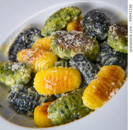 Multicoloured Gnocci potato peru italian food, Homemade Multicoloured Gnocci potato peru italian food, Homemade 99943196