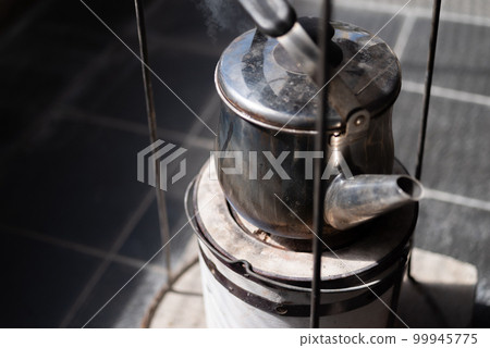 Kettle on the stove 99945775