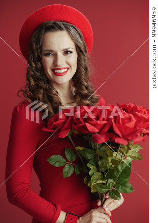 happy stylish woman in dress and beret against background happy stylish woman in dress and beret against background 99946939