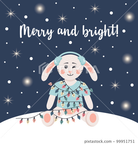 Cute rabbit in winter headphones is wrapped in a garland. Winter card with shining lights and snow. Merry and bright text. Cute rabbit in winter headphones is wrapped in a garland. Winter card with shining lights and snow. Merry and bright text. 99951751