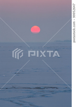 Winter sunset over the lake Balaton of Hungary Winter sunset over the lake Balaton of Hungary 99952647