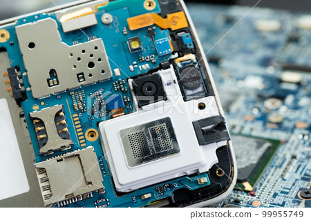 Repairing and upgrade mobile phone, electronic, computer hardware and technology concept. Repairing and upgrade mobile phone, electronic, computer hardware and technology concept. 99955749