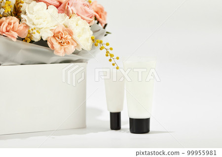 cosmetic beauty product bottle mockup and flower 99955981