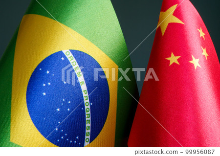 Close-up of the flags of Brazil and China. 99956087