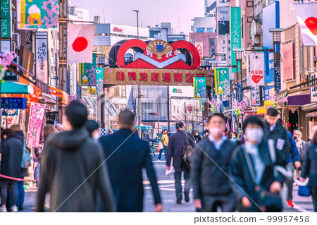 The cityscape of Tokyo, Japan, overlooking the Sugamo Jizo-dori Shopping Street. You can see JR Sugamo Station in the back. The cityscape of Tokyo, Japan, overlooking the Sugamo Jizo-dori Shopping Street. You can see JR Sugamo Station in the back. 99957458