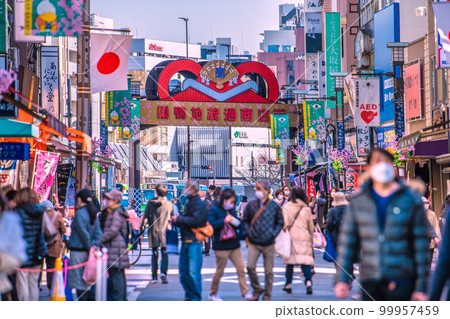 The cityscape of Tokyo, Japan, overlooking the Sugamo Jizo-dori Shopping Street. You can see JR Sugamo Station in the back. The cityscape of Tokyo, Japan, overlooking the Sugamo Jizo-dori Shopping Street. You can see JR Sugamo Station in the back. 99957459