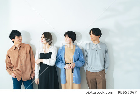 Portrait of a group of four young people 99959067