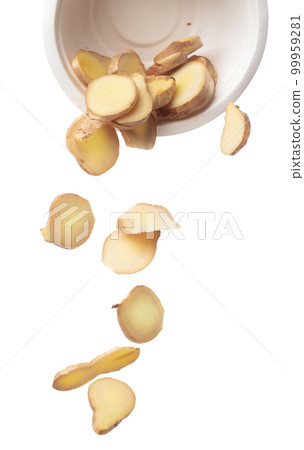 Ginger fall fly from bowl, fresh vegetable spice ginger falling. Organic fresh herbal ginger root head cut chop slice, close up texture. White background isolated freeze motion high speed shutter 99959281