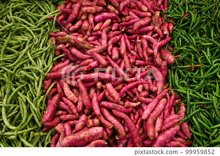 Fresh Sweet potato, green bean, yam on market. Local food. 99959852