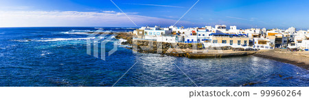 Scenic colorful traditional villages of Fuerteventura - El Cotillo in northen part of island. Canary islands of Spain Scenic colorful traditional villages of Fuerteventura - El Cotillo in northen part of island. Canary islands of Spain 99960264
