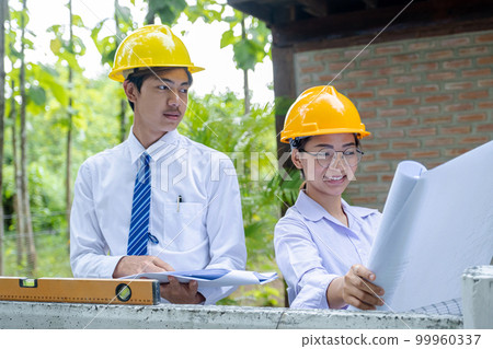 Engineer contractor team meeting work safety plan industry project and check design 99960337