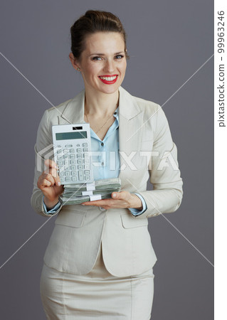 happy 40 years old business woman in light business suit happy 40 years old business woman in light business suit 99963246