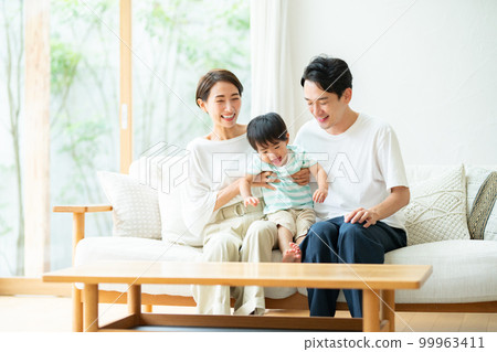 Three people family image 99963411